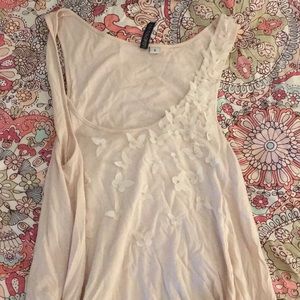 Beige tank with cut out butterfly’s